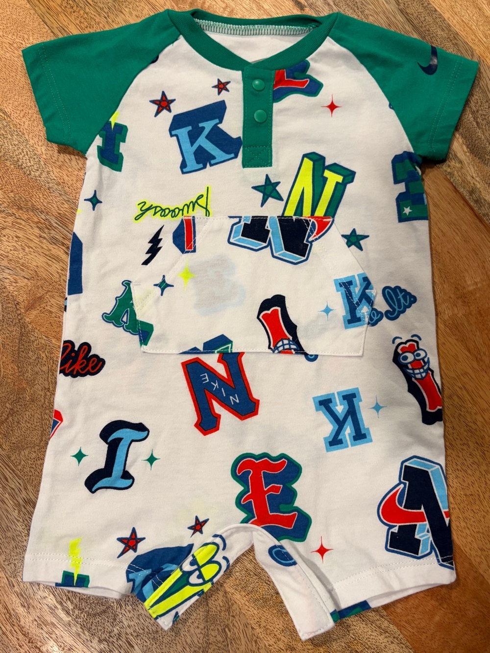 Nike White Romper with Green Sleeves and Multi-Color Letter Print